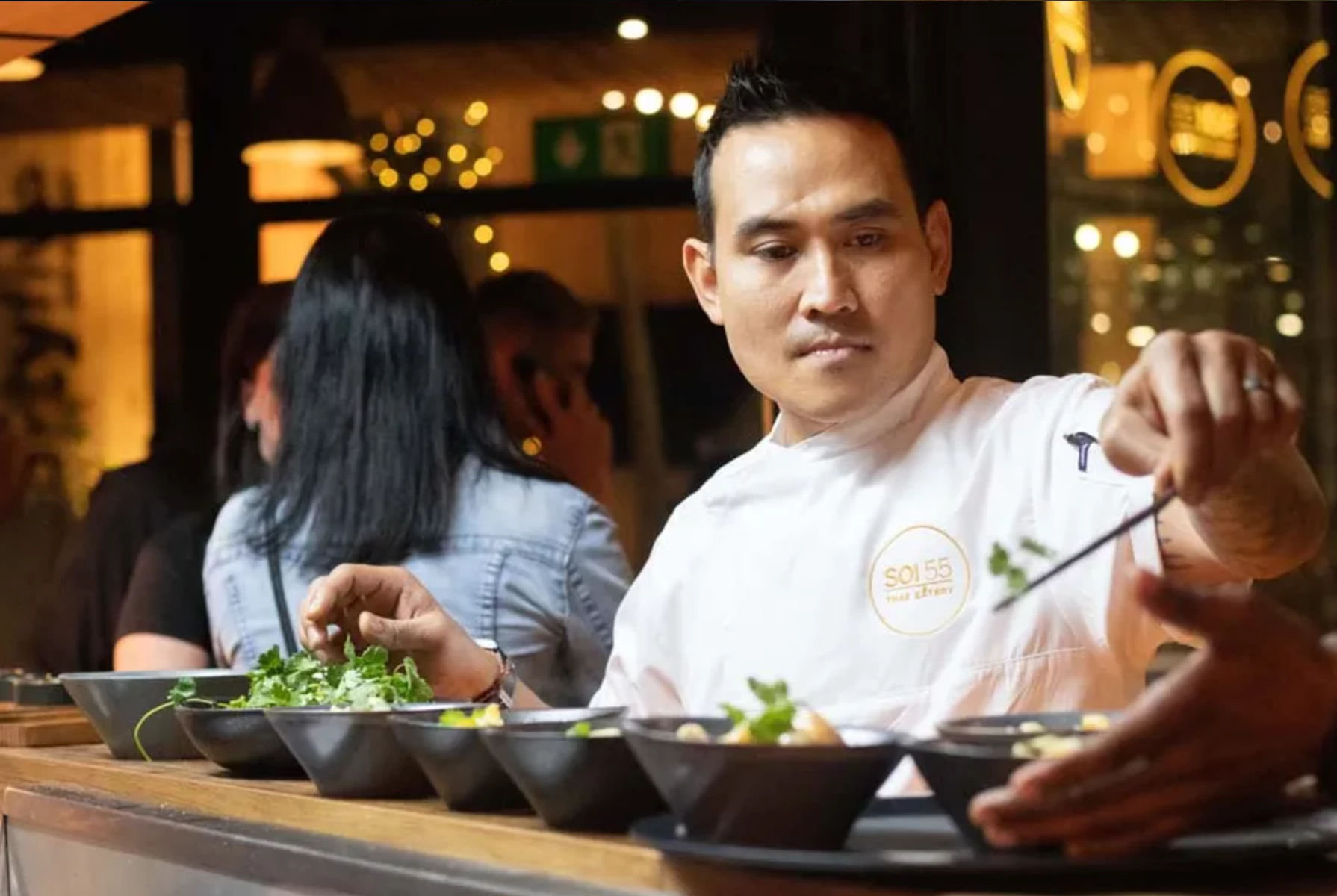 Chef plating dishes at SOI 55 Thai eatery in Ballito